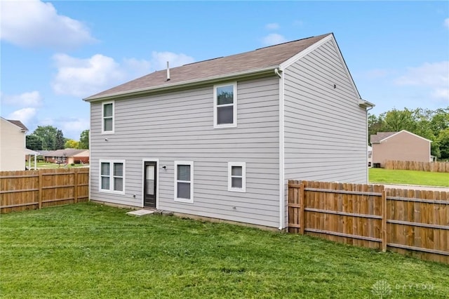 805 Marshall Dr, Xenia, OH 45385 - rear view of house with a fenced backyard