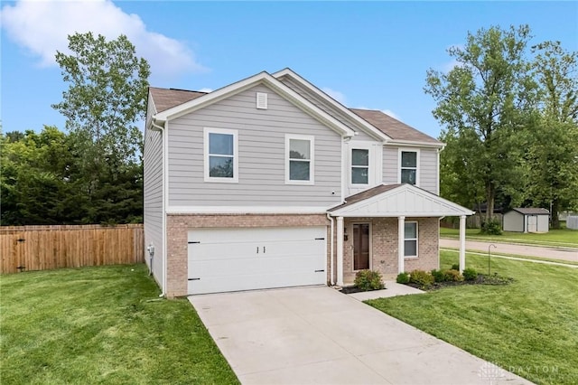805 Marshall Dr, Xenia, OH 45385 - view of front of property with brick siding, a garage, and concrete driveway