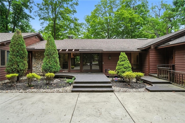 1917 Antrim Ct, Middletown, OH 45042 - property entrance featuring a shingled roof and stone siding