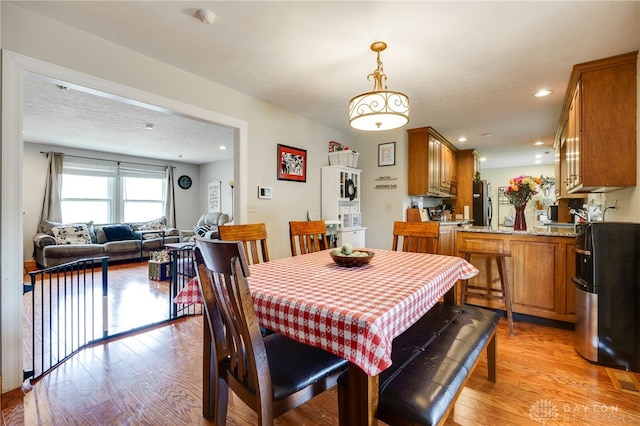 4930 Wildoak Ct, Dayton, OH 45424 - dining area featuring light wood-type flooring and recessed lighting