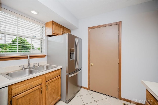 995 Wren Ct, Monroe, OH 45050 - kitchen featuring stainless steel fridge, light countertops, and dishwashing machine