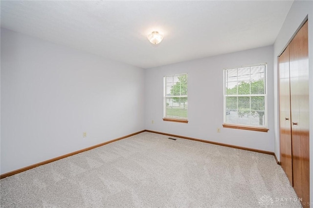 995 Wren Ct, Monroe, OH 45050 - empty room with carpet floors and baseboards