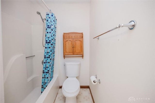 995 Wren Ct, Monroe, OH 45050 - bathroom featuring shower / bathtub combination with curtain and tile patterned flooring