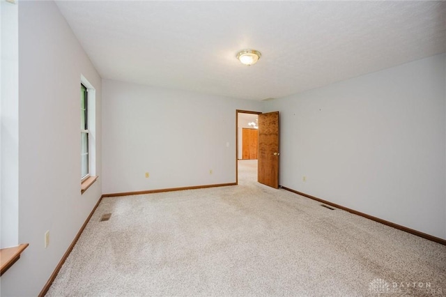995 Wren Ct, Monroe, OH 45050 - carpeted empty room with baseboards