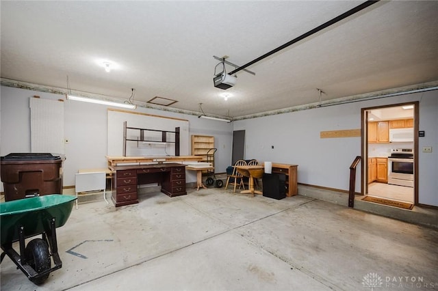 995 Wren Ct, Monroe, OH 45050 - garage featuring a garage door opener