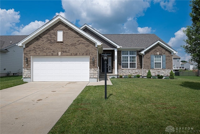 1693 Sunset Canyon Ct, Fairborn, OH 45324 - view of front of property featuring concrete driveway, an attached garage, a front yard, and brick siding