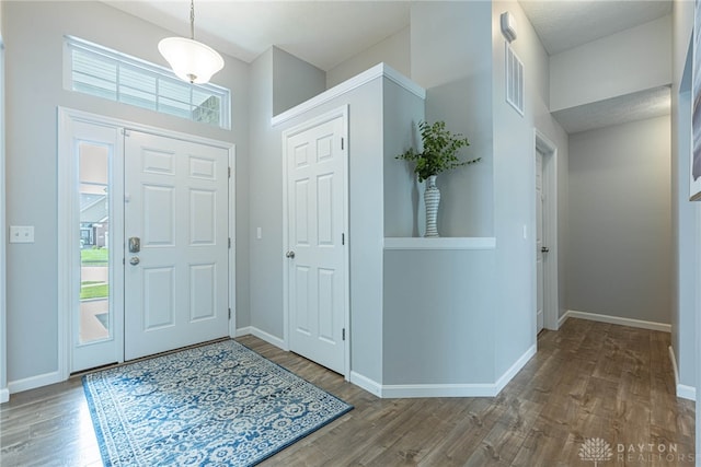 1693 Sunset Canyon Ct, Fairborn, OH 45324 - foyer featuring wood finished floors and plenty of natural light
