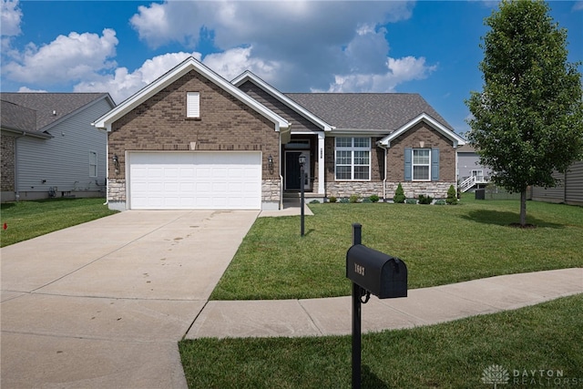 1693 Sunset Canyon Ct, Fairborn, OH 45324 - ranch-style house with concrete driveway, a front yard, an attached garage, stone siding, and brick siding