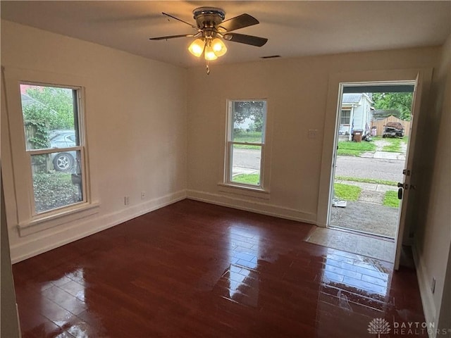 18 E Xenia St, Jamestown Vlg, OH 45335 - unfurnished room featuring dark wood-type flooring and a ceiling fan