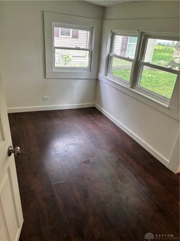 18 E Xenia St, Jamestown Vlg, OH 45335 - spare room with dark wood finished floors and baseboards