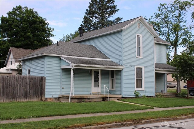 302 W 1st St, Arcanum, OH 45304 - traditional home featuring covered porch and a shingled roof