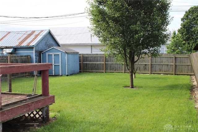 302 W 1st St, Arcanum, OH 45304 - fenced backyard with a storage unit