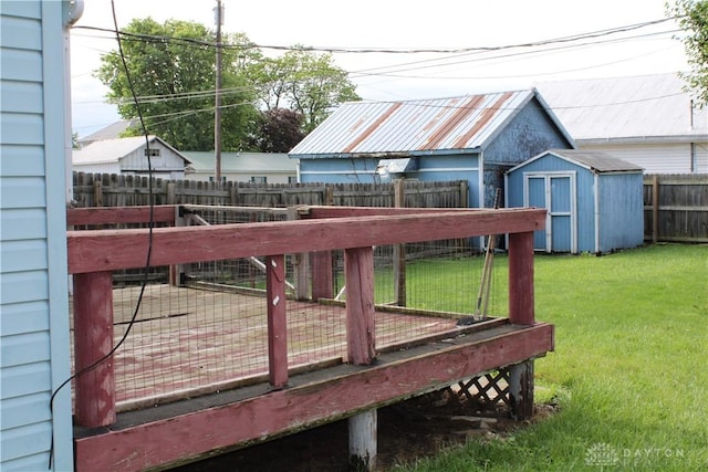 302 W 1st St, Arcanum, OH 45304 - wooden deck with a fenced backyard and a shed
