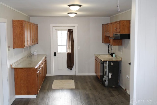 302 W 1st St, Arcanum, OH 45304 - kitchen featuring crown molding, brown cabinetry, dark wood-style flooring, light countertops, and exhaust hood