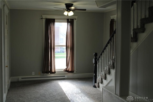 302 W 1st St, Arcanum, OH 45304 - carpeted foyer entrance with baseboard heating, stairway, crown molding, healthy amount of natural light, and ceiling fan