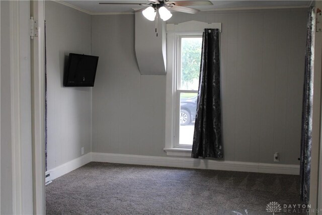 302 W 1st St, Arcanum, OH 45304 - spare room featuring carpet flooring, ceiling fan, and ornamental molding