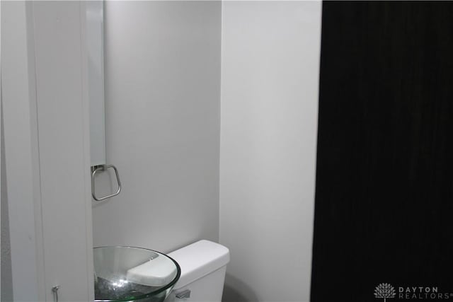 302 W 1st St, Arcanum, OH 45304 - bathroom featuring toilet