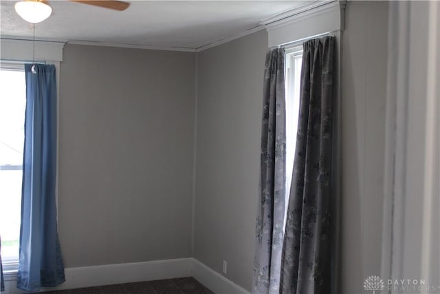302 W 1st St, Arcanum, OH 45304 - empty room featuring a ceiling fan and ornamental molding