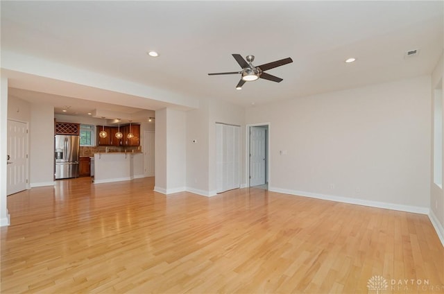 964 Auburnview Dr Unit 3E, Cincinnati, OH 45206 - unfurnished living room with light wood-style flooring, ceiling fan, and recessed lighting