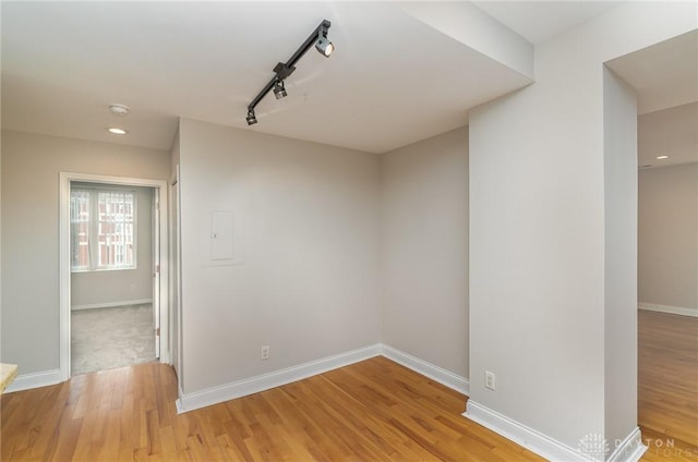 964 Auburnview Dr Unit 3E, Cincinnati, OH 45206 - unfurnished room with track lighting, light wood finished floors, and recessed lighting