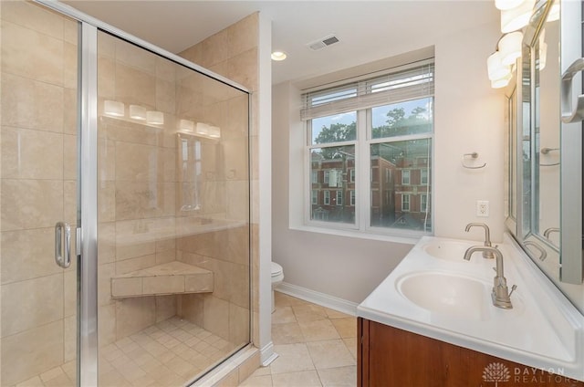 964 Auburnview Dr Unit 3E, Cincinnati, OH 45206 - bathroom featuring double vanity, a stall shower, and tile patterned floors