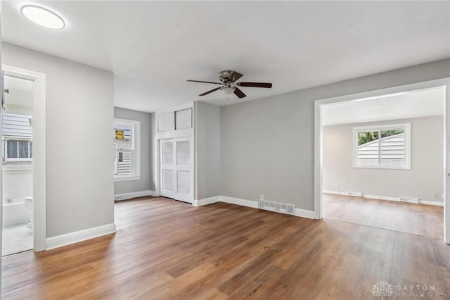 610 N Spring St, Wilmington, OH 45177 - spare room featuring ceiling fan and wood finished floors