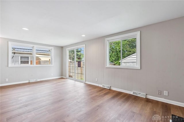610 N Spring St, Wilmington, OH 45177 - empty room featuring wood finished floors and recessed lighting