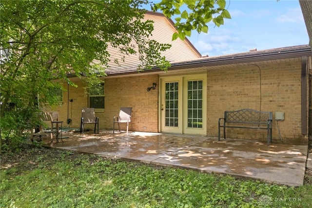 1620 Ambridge Rd, Dayton, OH 45459 - rear view of house featuring brick siding and a patio