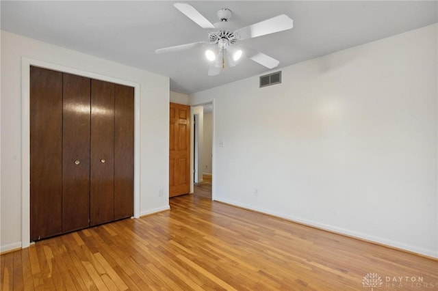 1620 Ambridge Rd, Dayton, OH 45459 - unfurnished bedroom with light wood-style flooring, a closet, and a ceiling fan