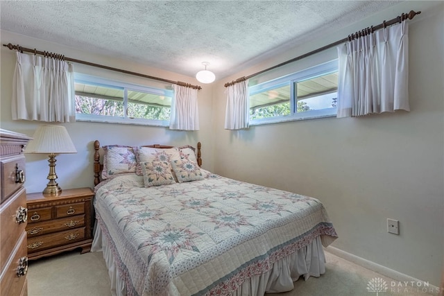 9131 Shawhan Dr, Centerville, OH 45458 - carpeted bedroom with a textured ceiling and baseboards