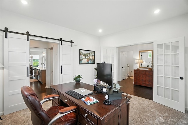 4835 Granada Ct, Liberty Twp, OH 45044 - office featuring a barn door, recessed lighting, and dark wood-style flooring