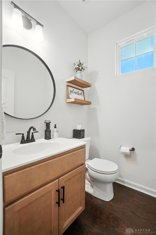 4835 Granada Ct, Liberty Twp, OH 45044 - half bath with vanity and wood finished floors