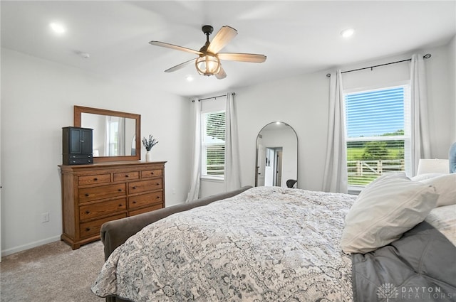 4835 Granada Ct, Liberty Twp, OH 45044 - bedroom featuring light carpet, arched walkways, recessed lighting, and ceiling fan