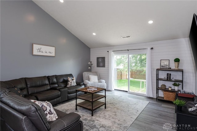 160 Worthington Dr, Germantown, OH 45327 - living area with recessed lighting, wood walls, wood finished floors, and vaulted ceiling