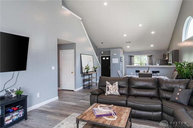 160 Worthington Dr, Germantown, OH 45327 - living area featuring high vaulted ceiling, wood finished floors, and recessed lighting