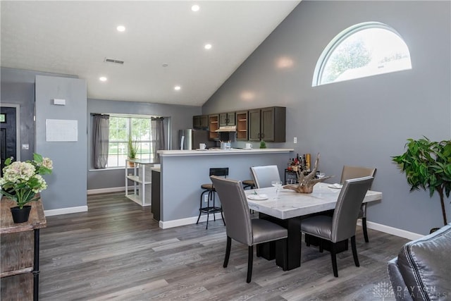 160 Worthington Dr, Germantown, OH 45327 - dining area featuring wood finished floors, high vaulted ceiling, and recessed lighting