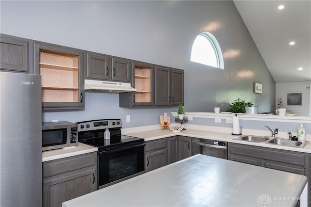 160 Worthington Dr, Germantown, OH 45327 - kitchen with appliances with stainless steel finishes, under cabinet range hood, open shelves, high vaulted ceiling, and light countertops