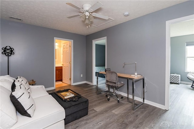 160 Worthington Dr, Germantown, OH 45327 - office area featuring wood finished floors, a ceiling fan, and a textured ceiling
