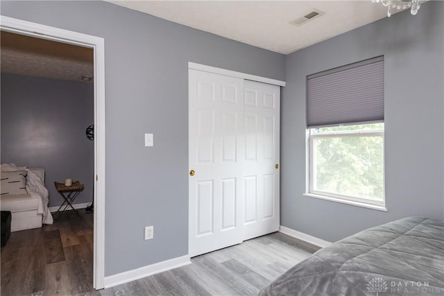 160 Worthington Dr, Germantown, OH 45327 - bedroom featuring wood finished floors and a closet