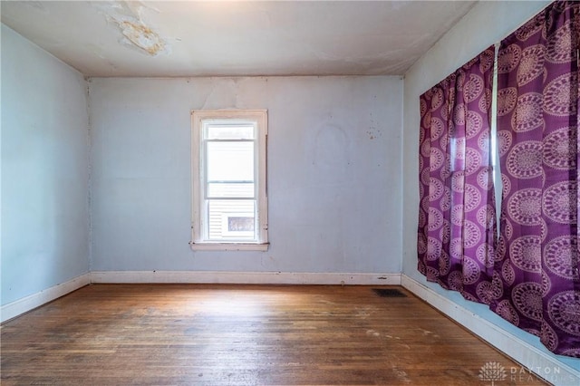 246 N D St, Hamilton, OH 45013 - empty room featuring hardwood / wood-style floors and baseboards