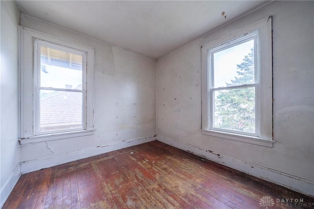 246 N D St, Hamilton, OH 45013 - unfurnished room featuring hardwood / wood-style floors and baseboards