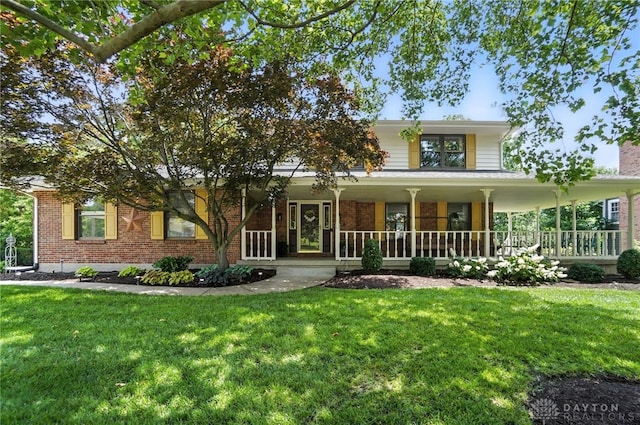 356 Saint James Pl, Springboro, OH 45066 - view of front facade featuring brick siding, a front yard, and covered porch