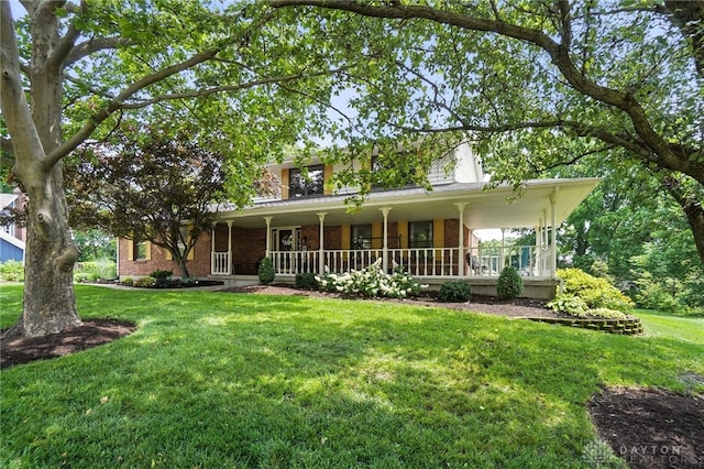 356 Saint James Pl, Springboro, OH 45066 - view of front of home featuring brick siding, a porch, and a front yard