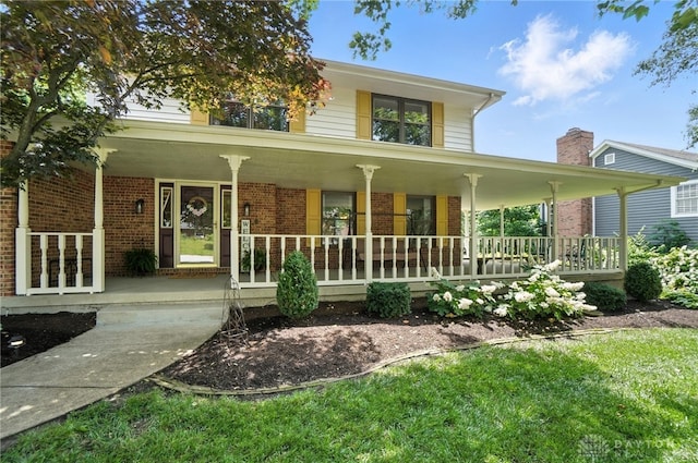 356 Saint James Pl, Springboro, OH 45066 - farmhouse with covered porch and brick siding