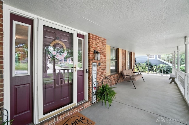 356 Saint James Pl, Springboro, OH 45066 - entrance to property featuring a porch and brick siding