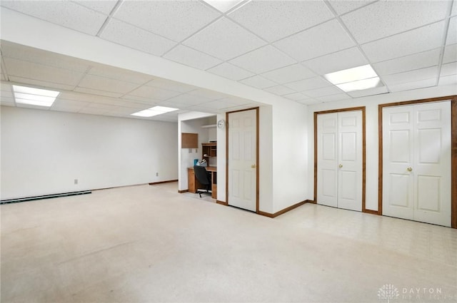 356 Saint James Pl, Springboro, OH 45066 - below grade area featuring a paneled ceiling and a baseboard radiator