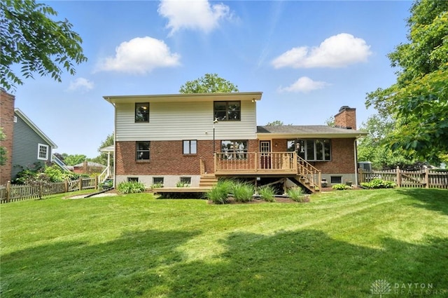 356 Saint James Pl, Springboro, OH 45066 - rear view of house featuring a fenced backyard, stairway, a wooden deck, and brick siding