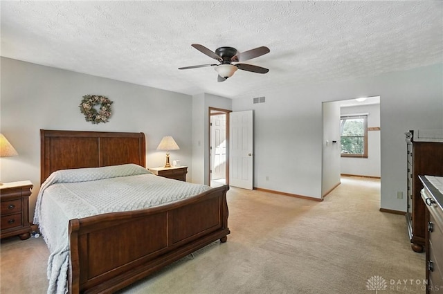 356 Saint James Pl, Springboro, OH 45066 - bedroom featuring light carpet, a textured ceiling, and ceiling fan