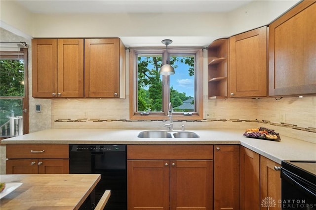 356 Saint James Pl, Springboro, OH 45066 - kitchen with black appliances, tasteful backsplash, pendant lighting, brown cabinetry, and open shelves