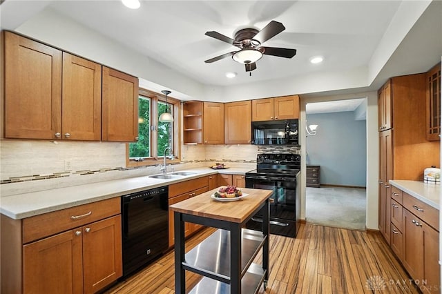 356 Saint James Pl, Springboro, OH 45066 - kitchen with black appliances, light wood finished floors, light countertops, a ceiling fan, and open shelves